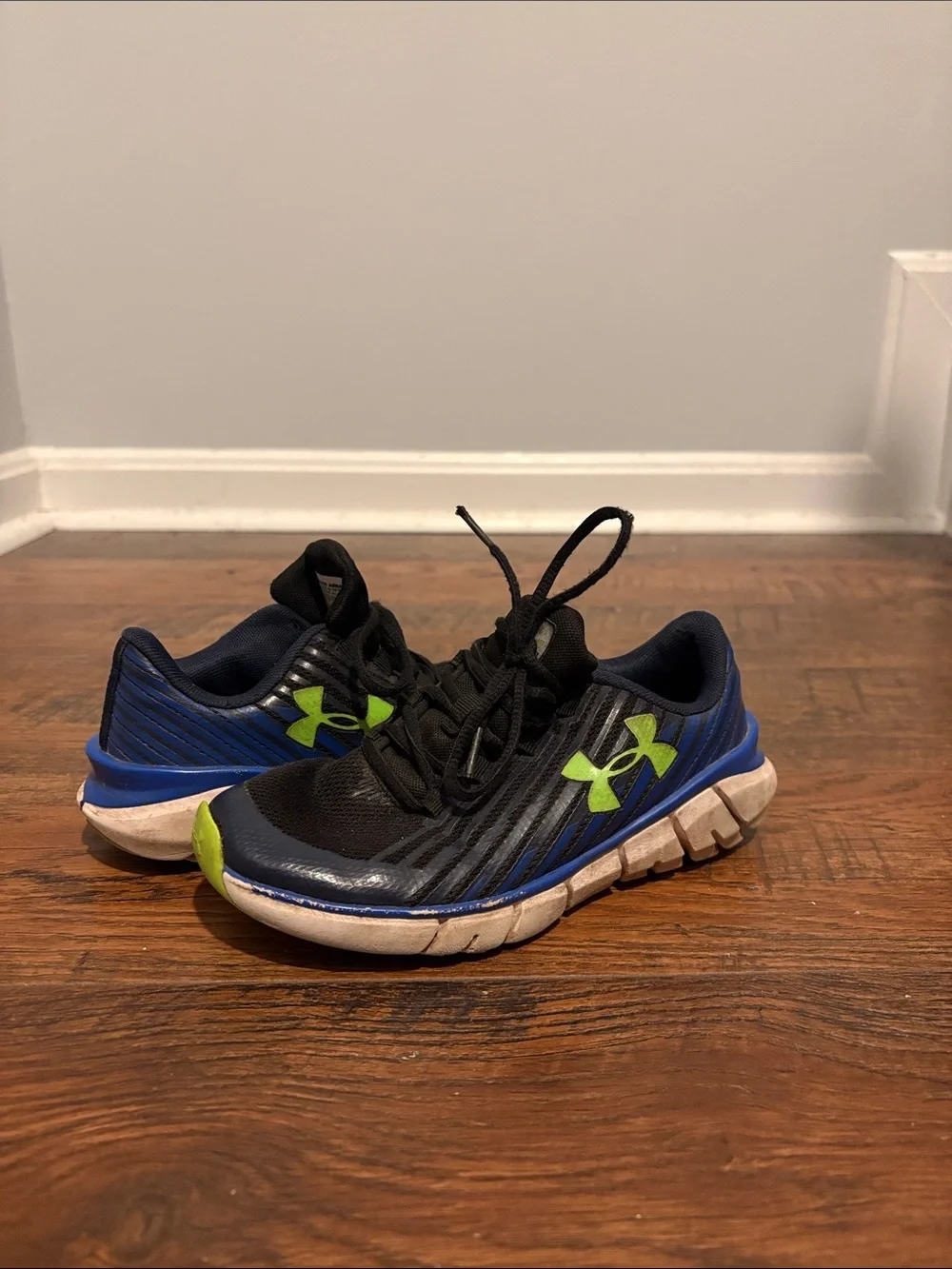 Under Armour Black and Navy Blue Running Shoes with Lime Accent